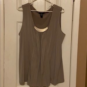 Alfa is sleeveless top with metal Embellishment